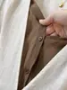 Colete Feminino de Verão Falso Duas Peças em Algodão Linho Sem Mangas Design Moderno Cor Color Block Gola V Solto Bainha Plissada Top Emagrecedor