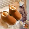 Botas de nieve para niños 2026 nuevo estilo de invierno, forradas de felpa y engrosadas, antideslizantes, de suela blanda, impermeables, para niñas y niños, botas de algodón de moda