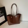 Bolso bandolera simple de gran capacidad para el día a día, nuevo modelo principios de otoño 2026, bolso tote de color liso único y dulce, bolso de hombro elegante