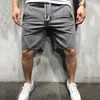 Pantalones Deportivos Transfronterizos Estilo Europeo y Americano para Hombre Lisos para Correr y Entrenamiento Color Sólido Exportación Pantalones de Cinco Puntos
