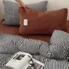 Juego de ropa de cama de cuatro piezas engrosado y cálido hecho de terciopelo de leche, con un diseño de alto peso, artístico y minimalista, adecuado para otoño e invierno, que incluye una sábana y una funda de edredón