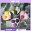 Huevos de maquillaje de belleza al por mayor embalaje independiente no come polvo calabaza gotas de agua corte oblicuo huevos de maquillaje esponja de maquillaje borla para polvo