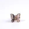 Pinza de Agarre Pequeña de Mariposa Hueca y Punto de Leopardo de 2.5 cm Pinza para el Cabello Mini Princesa Femenina Accesorios para el Cabello Calientes Transfronterizos