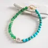 Collar asimétrico de bloqueo de color acrílico de perlas de dopamina europeo y americano, cadena para la clavícula personalizada de nicho transfronterizo de alta gama para mujeres