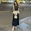 Elegante Conjunto de Falda Reductor de Edad para Mujer Verano Nuevo Estilo Delgado Top sin Mangas Reductor de Edad Falda Temperamento Conjunto de Dos Piezas