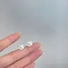 Novedad 2025 Pendientes de Perla Sencillos Versátiles Moda Femenina Elegante Diseño de Nicho Pendientes de Botón de Alta Gama
