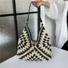 Bolsa tejida popular de celebridad de internet de gran capacidad para mujer 2026 Verano Nuevo Bolso de hombro único de paja Informal Bolso de playa para el mar