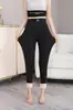 Calças quentes de veludo de camelo outono e inverno cintura alta forradas com fleece grossas long johns masculinas e femininas de casal alta elasticidade cor sólida aquecimento calça de baixo de algodão