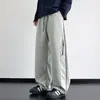 Nuevos pantalones casuales de pierna recta para trabajo de primavera y otoño para hombre, con un diseño moderno estilo americano, corte holgado, talla grande, versátil y un look sofisticado con perneras anchas.
