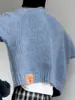 Nueva colección otoño/invierno 2025: Suéter tejido casual retro americano, de corte relajado y cuello en V, prenda exterior de color liso para hombre