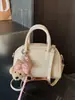 Bolso de Mano Minimalista Boston 2026 Modelo Nuevo Bolso de Bowling de Gama Alta Versátil de Nicho Bolso Cuadrado Pequeño Bolso Cruzado