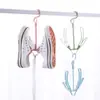 Gancho doble creativo a prueba de viento para balcón, perchero multiusos para zapatos, gancho para tendedero de dormitorio, zapatero anti-caída y a prueba de viento para secar