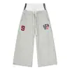 Fabricante Original Retrô Americano Calça de Moletom Patchwork com Letras de Cintura Dupla Unissex Perna Larga Solta Costa Oeste