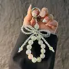 Cadena para teléfono de mariposa de cristal rosa, cordón antipérdida, llavero de alambre de acero de cristal de lujo ligero, exquisito, de alta gama, colgante para bolso