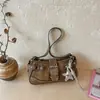 Bolso de moda con estampado de leopardo para mujer, versión coreana, nuevo bolso de moda otoño e invierno 2026, diseño casual de retazos, bolso texturizado para el hombro