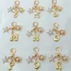 Novo Lançamento Transfronteiriço Popular Fofo Moderno Bolha 26 Letra de Cobre Estrela do Mar Concha Pingente Bolsa de Mulher Chaveiro