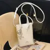 Bolso de Teléfono Móvil de Moda con Textura de Gama Alta para Mujer Otoño e Invierno 2025 Nuevo Popular Bolso de Papas Fritas de un Solo Hombro Bolso Cruzado Pequeño Versátil
