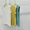 Camiseta de algodón color liso con manga corta y diseño de copo de nieve para mujer, top casual de verano con bordado pequeño de caballo en la espalda, hombro normal y cuello redondo