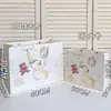 Bolsa de Regalo de Diario Dormilón de Dibujos Animados con Ilustración de Panda Pequeño, Bolso para Empaquetar Regalos Navideños, Disponible en Stock y Personalizable