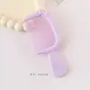 Nuevo mini peine de dibujos animados lindo con lazo, alto valor estético, peine de mango portátil para el hogar, peine para peinar para estudiantes