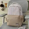 Mochila Xadrez Marrom Quente com Textura Patchwork Cheia de Vitalidade para Meninas do Ensino Fundamental e Médio para a Aula e Viagem