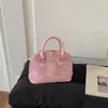 Bolsas de Luxo para Mulheres 2026 Novo Estilo Nicho Versátil Bolsa Transversal para o Dia a Dia Bolsa de Mão Fashion Retrô Bolsa Concha
