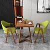 Mesa y sillas de reunión de estilo nórdico, moda italiana, lujo ligero; mesa de recepción y negociación de negocios de alta gama, mesa de ocio para patio