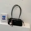 Bolso de axila de nicho estilo francés para mujer, nueva colección otoño/invierno 2026, bolso de hombro casual retro, bolso baguette de alta gama para el trabajo