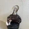 Bolso de mujer vintage de alta gama estilo francés 2026 nuevo bolso de hombro de moda bolso tote versátil para el día a día bolso de mano de moda