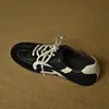 Zapatos de entrenamiento alemanes negros de punta redonda, suela plana, con cordones, para mujer, nuevo modelo 2026, zapatos deportivos casuales para exteriores de suela blanda