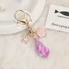 Llavero Colgante de Concha Estrella de Mar Caracola Popular de Venta Caliente Transfronterizo Colgante para Bolso Creativo Colgante para Mochila de Estudiante Marino