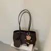 Ruien 2026 Otoño Nuevo Bolso Pequeño Casual de Moda Estilo Coreano Bolso de Hombro de Nicho para Niñas Bolso Cuadrado Pequeño de Mano