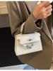 2025 Kelly Primavera Nuevo Candado Bolso Plateado Transfronterizo Lujo Ligero Textura de Alta Gama Bandolera de Hombro Bolso Cuadrado Pequeño para Mujer