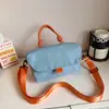 Bolsa Quadrada Pequena Color Block Estilo Coreano Ins para Mulheres 2026 Novo Modelo Bolsa de Mão Bolsa Transversal Bolsa de Ombro Simples Tendência para o Dia a Dia