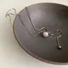 Collar con Colgante Saturno de Perla Nueva 2025 de Alta Gama Ajustable para Otoño e Invierno Cadena para Suéter de Acero Titanio Accesorios para Mujer
