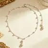 Colar de pérolas sem costas estilo europeu e americano, corrente traseira com pingente de pérola sintética em formato de gota, colar de pérolas versátil de luxo leve para mulheres
