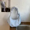 Bolso plisado dulce y elegante estilo coreano de gran capacidad, bolso tipo dumpling único y moderno para el uso diario, bolso de hombro o axila con tejido estampado de estrellas