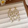 Pendientes Largos con Borla de Flor de Zirconia con un Toque de Lujo Ligero y de Alta Gama, Pendientes de Artesanía Pesada Estilo Bosque, Modernos y de Diseño Único