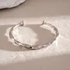 Pulsera geométrica abierta en forma de C metálica lisa europea y americana, pulsera personalizada de nicho ins transfronteriza, joyería de alta gama a la moda