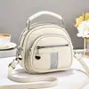 Bolso de mujer 2026 nuevo modelo multibolsillos con cremallera, bolso de mano redondo pequeño, simple y versátil para ir al trabajo, bolso de hombro y cruzado