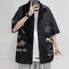 Camisa estilo Hong Kong estilo japonés para hombre, informal, de verano, combinable, de manga corta, con estampado de grafiti, moderna, chaqueta de manga corta.