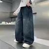 Jeans de pierna ancha curvados de color oscuro para niños con diseño de línea de primavera y otoño, cintura elástica elegante, corte holgado, pantalones largos modernos para niños mayores