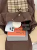Mochila de Cuadros de Dibujos Animados Nueva Transfronteriza para Niñas, Bolso Escolar de Viaje, Mochila Linda Versátil para el Uso Diario y el Trabajo