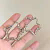 Pendientes Minimalistas de Metal Brillante Cuadrados con Estrella Moda Simples Versátiles Pendientes de Botón Lujo Ligero Pendientes de Gama Alta Venta al por Mayor