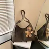 2026 Nueva Bolsa de Hombro Simple de Gran Capacidad para Viajes Diarios Bolso Tote de Nicho Bolso Cruzado de Color Sólido Moderno y Tendencia