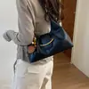Bolsa de ombro de nicho estilo retrô, bolsa transversal versátil para mulheres, bolsa de couro macio estilo bolinho para debaixo do braço 2026, novo estilo para o dia a dia
