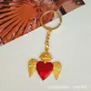 Chaveiro Estilo Gótico Transfronteiriço, Acessórios de Pingente de Metal Retrô, Asas de Coração de Pêssego, Pingente de Cruz Escura