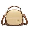 Bolsas 2025 Nova Bolsa Transversal de Ombro Feminina de Alto Padrão com Bordado Versátil para Roupas de Trabalho Pequena Bolsa Redonda de Mão em Couro Macio