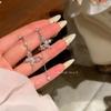 Aretes de borla de circonio de garra de alta calidad con aguja de plata 925 para mujer, temperamento de nicho de lujo ligero, aretes largos, aretes adelgazantes para rostro redondo
