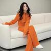 Conjunto de suéter color naranja calabaza y pantalones Traje holgado Estilista rejuvenecedor Estilo coreano relajado Conjunto de ootd Para usar a principios de primavera